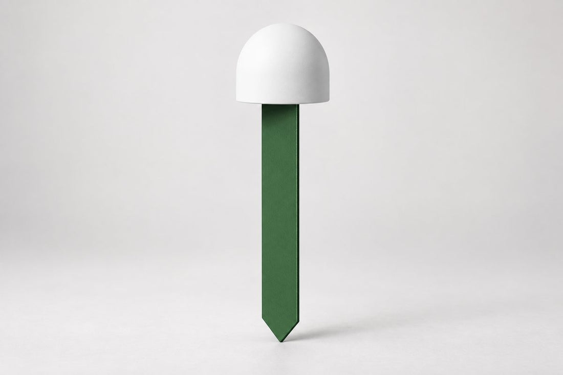 The SoilDrops soil sensor: a white dome on a green probe